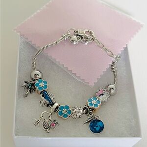 Silver Tone Blue Floral Charm Bracelet Palm Tree Travel Globe Dangles